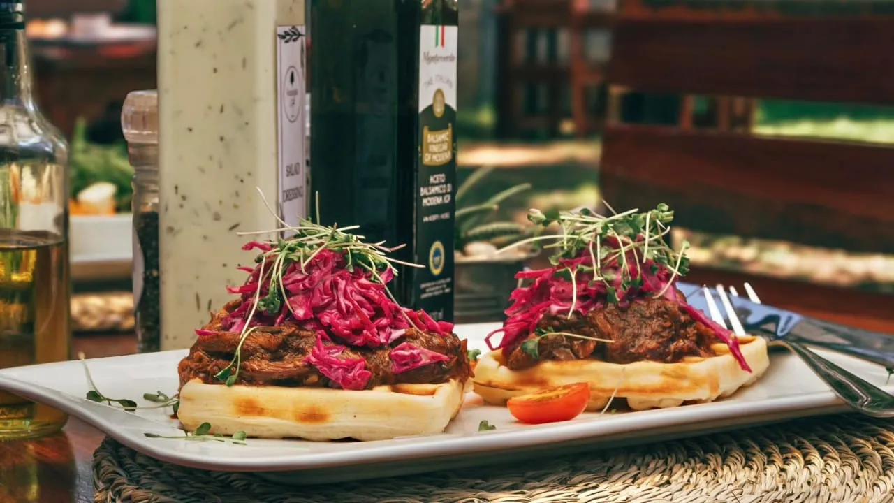 Waffles with meat and beetroot on top